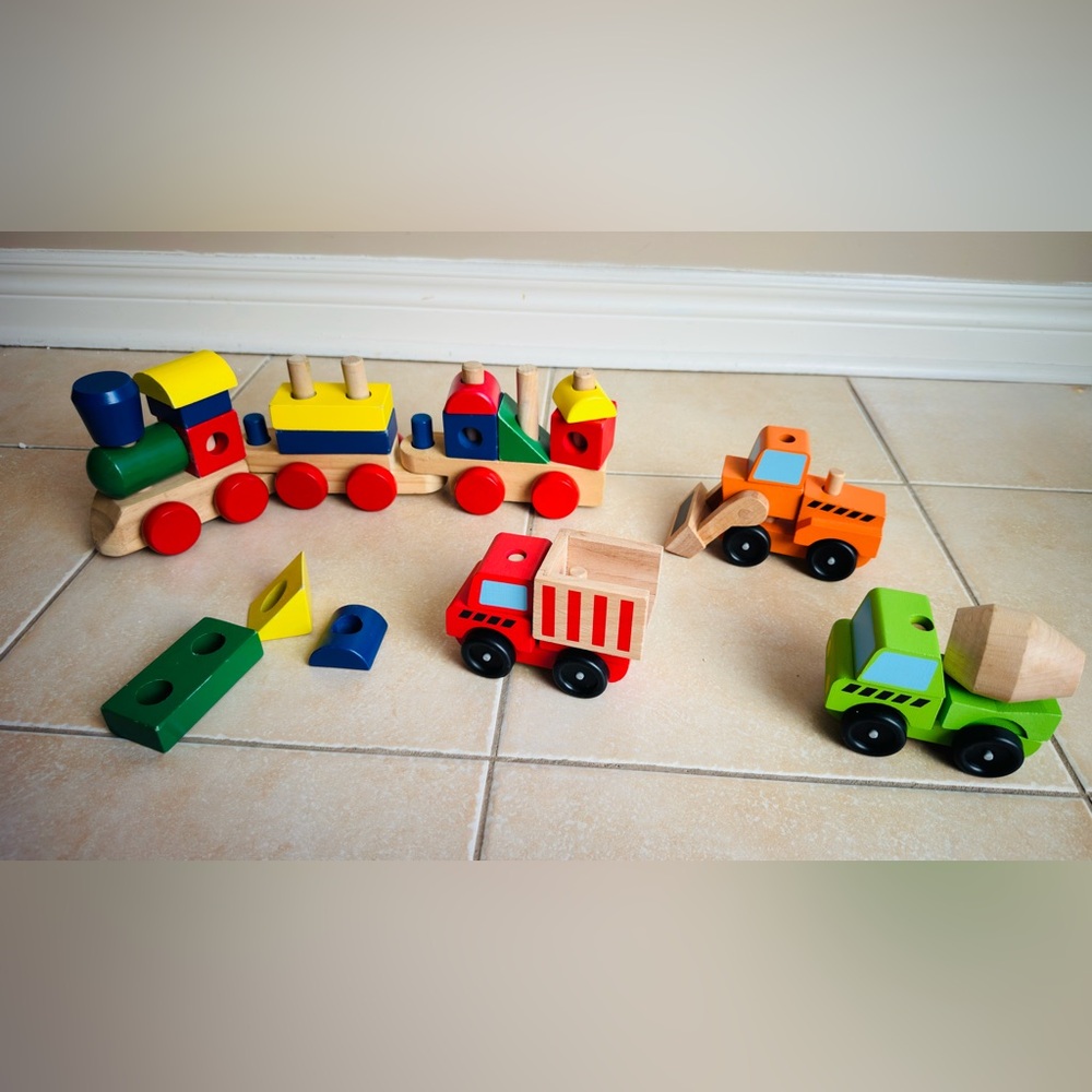 Melissa and Doug wooden train and construction vehicles